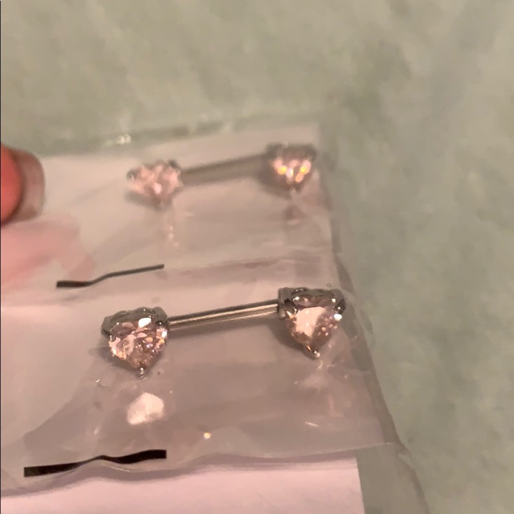 Pink heart nipple rings